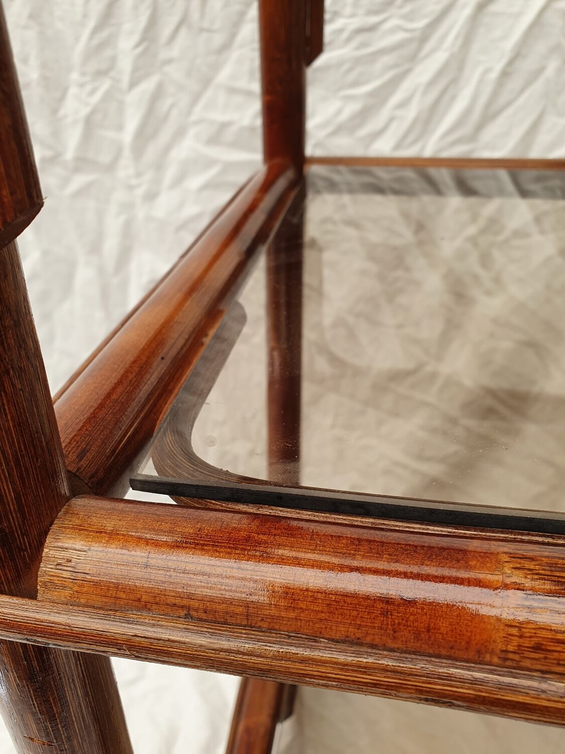 Rattan and smoked glass side table