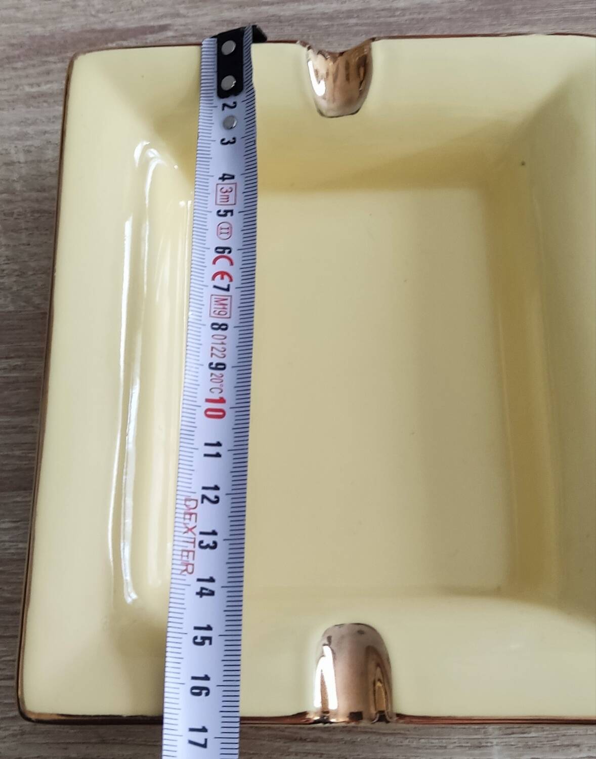 Vintage fine yellow and gold porcelain ashtray.