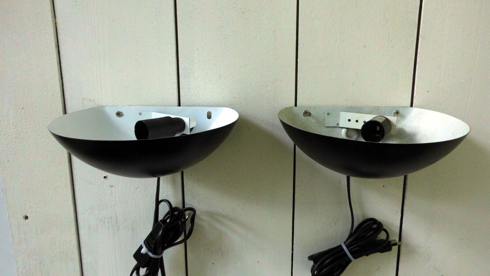Pair wall sconces in black metal