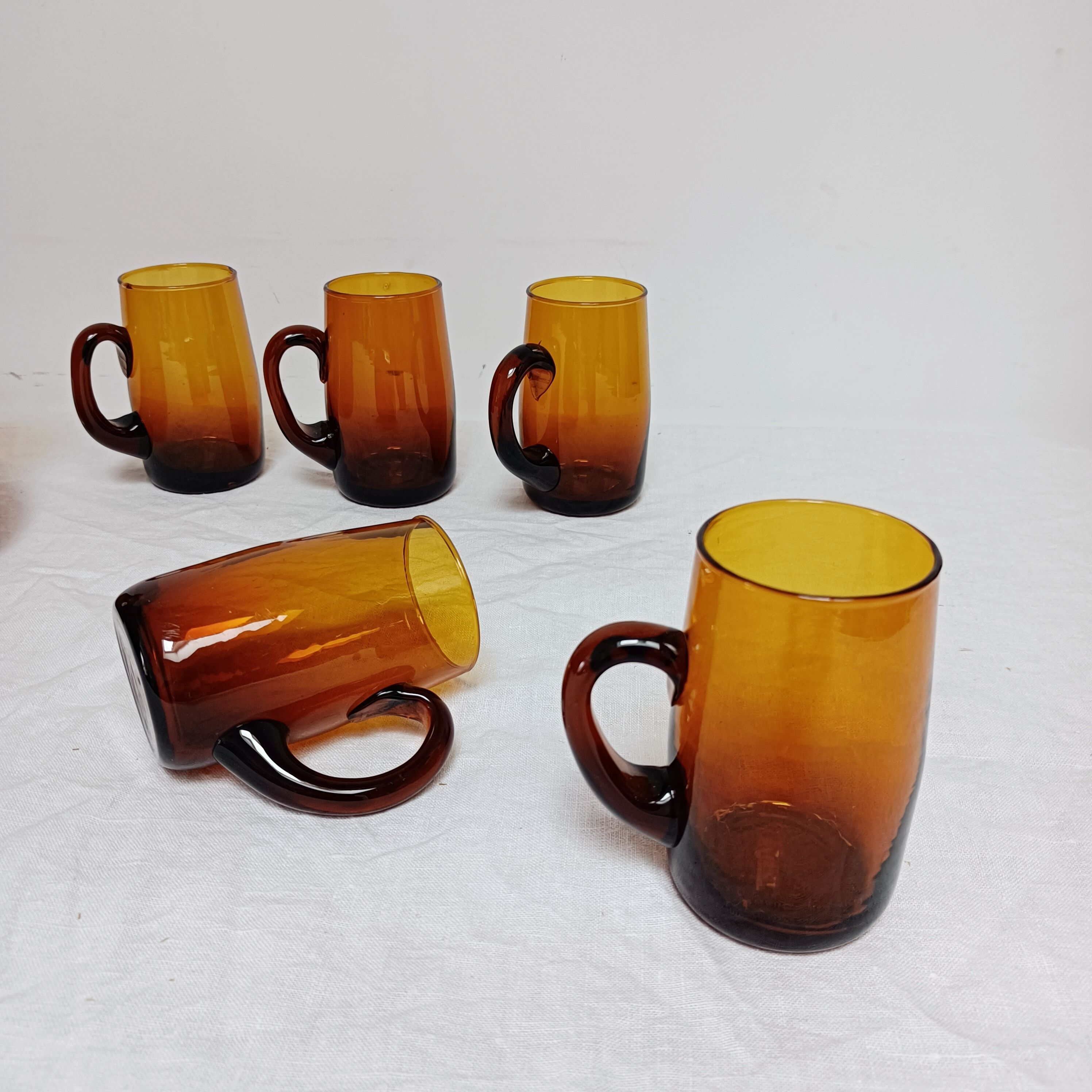 Amber glass decanter and its 5 glasses