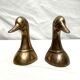 Paires de serres livres têtes de canards en laiton