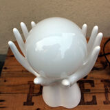 Hand-shaped lamp and opaline globe