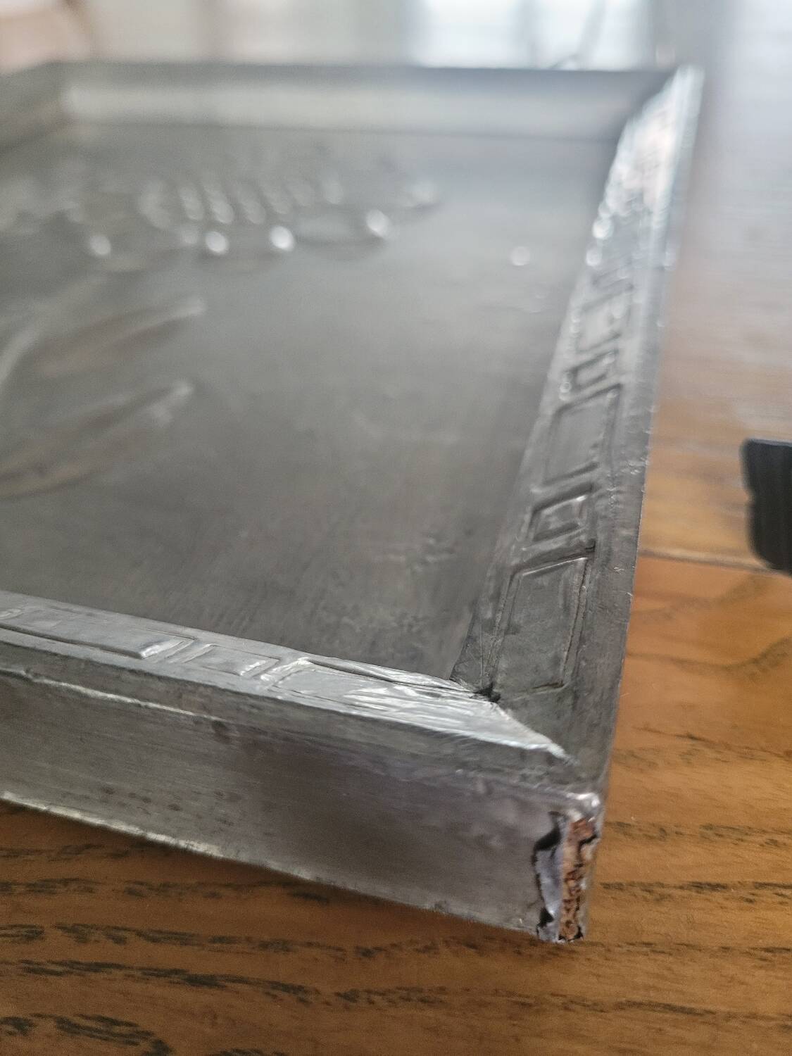 Pair of embossed flower paintings