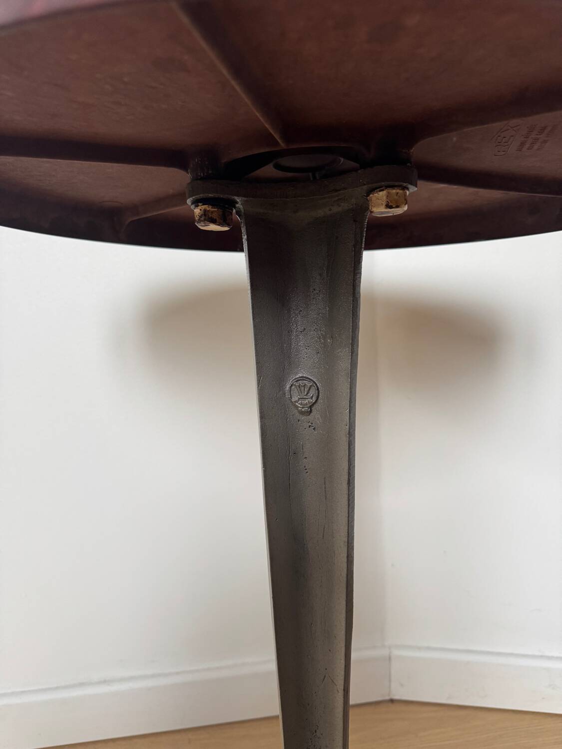 Rare Louis Vuitton cast iron bistro table with a bakelite top.