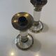 Pair of candlestick holders in crystal and gilded brass, Baccarat decoration.