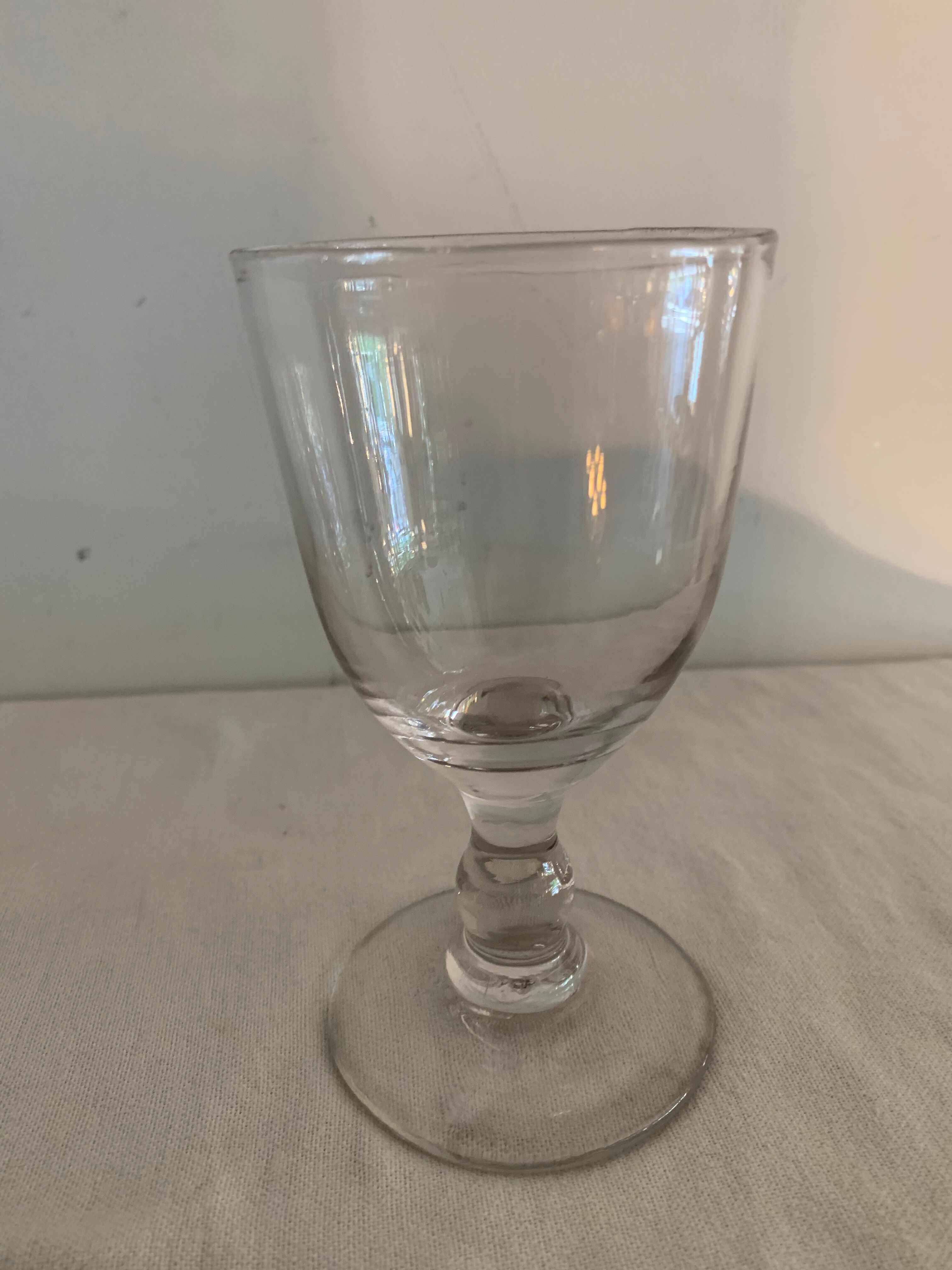 8 old blown and different foot wine glasses