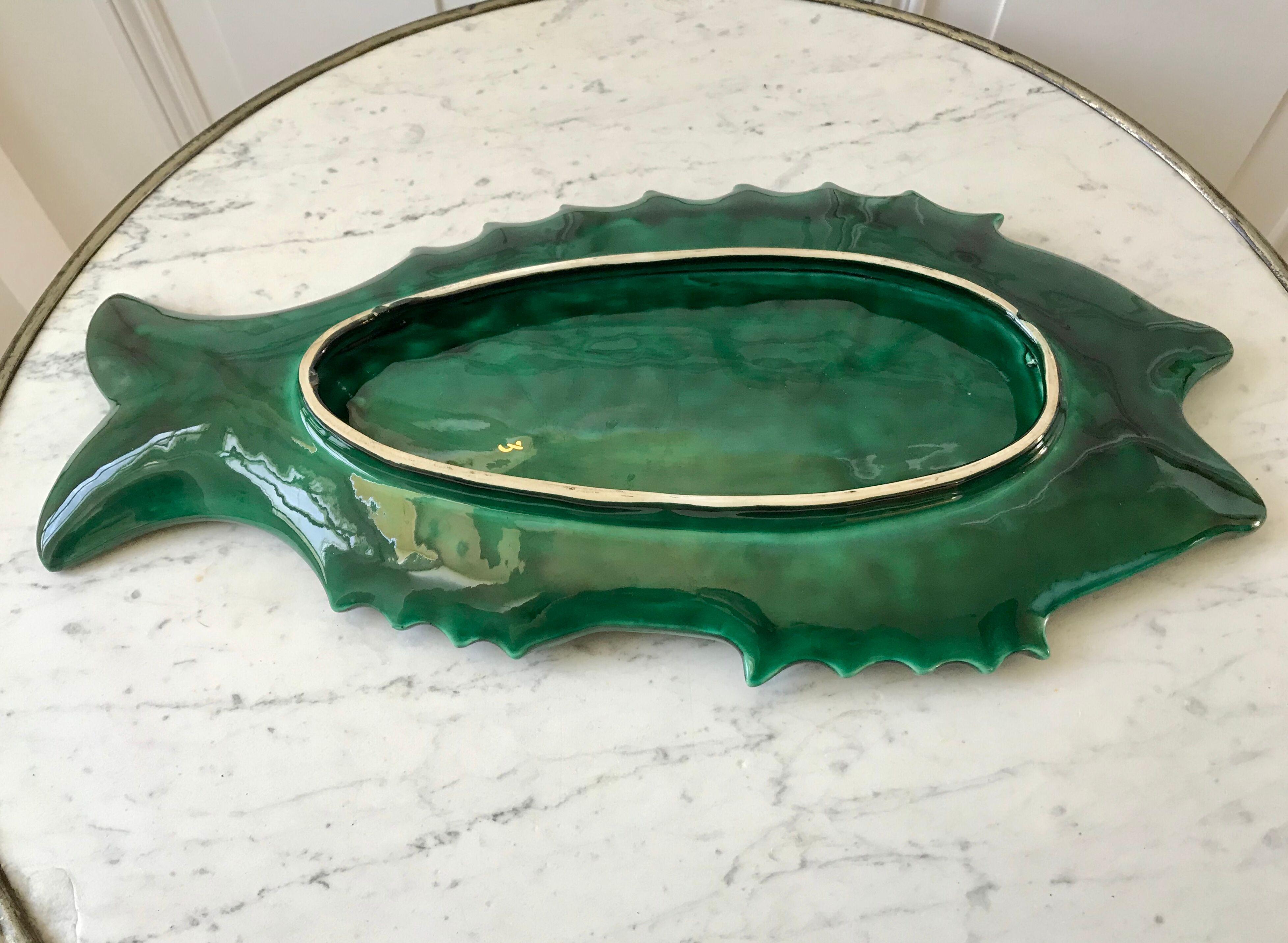 Fish dish in green and golden slurry 50s