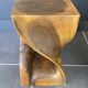 Stool n2 in solid raw walnut wood carved from the mass 1970