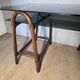 Bureau en rotin double plateau en verre fumé, années 70.