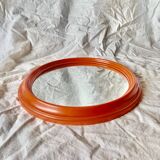 Vintage orange plastic oval wall mirror