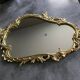 Miroir en bronze doré style rocaille 68 x 42 cm