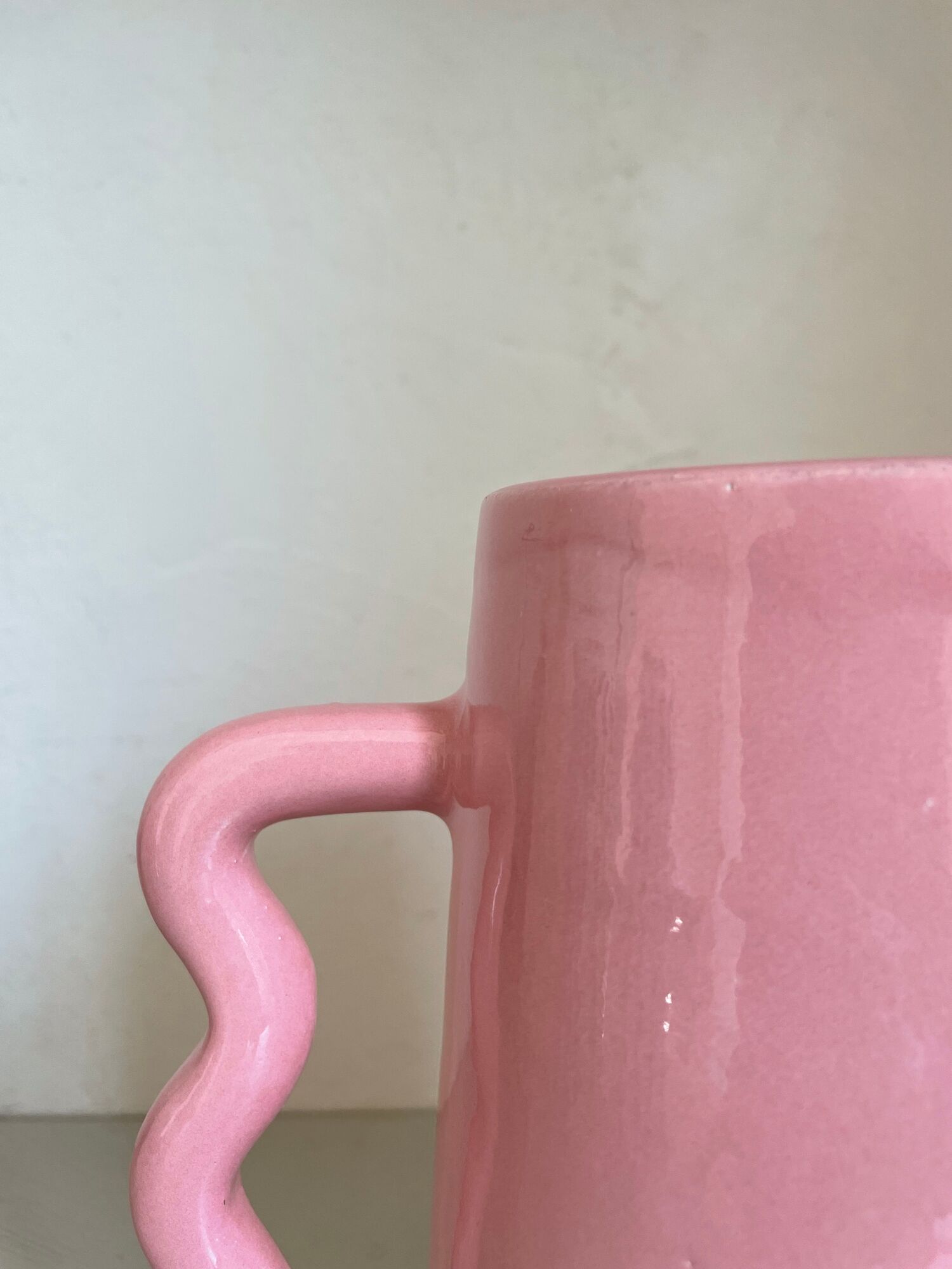Handmade abstract corrugated handle pink ceramic vase