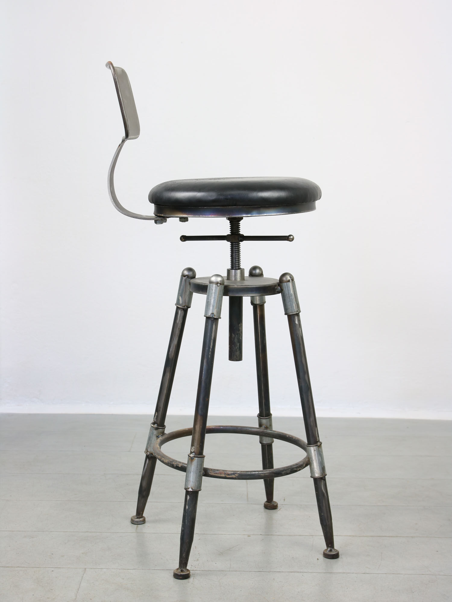 Vintage industrial metal & leather swivel bar stool