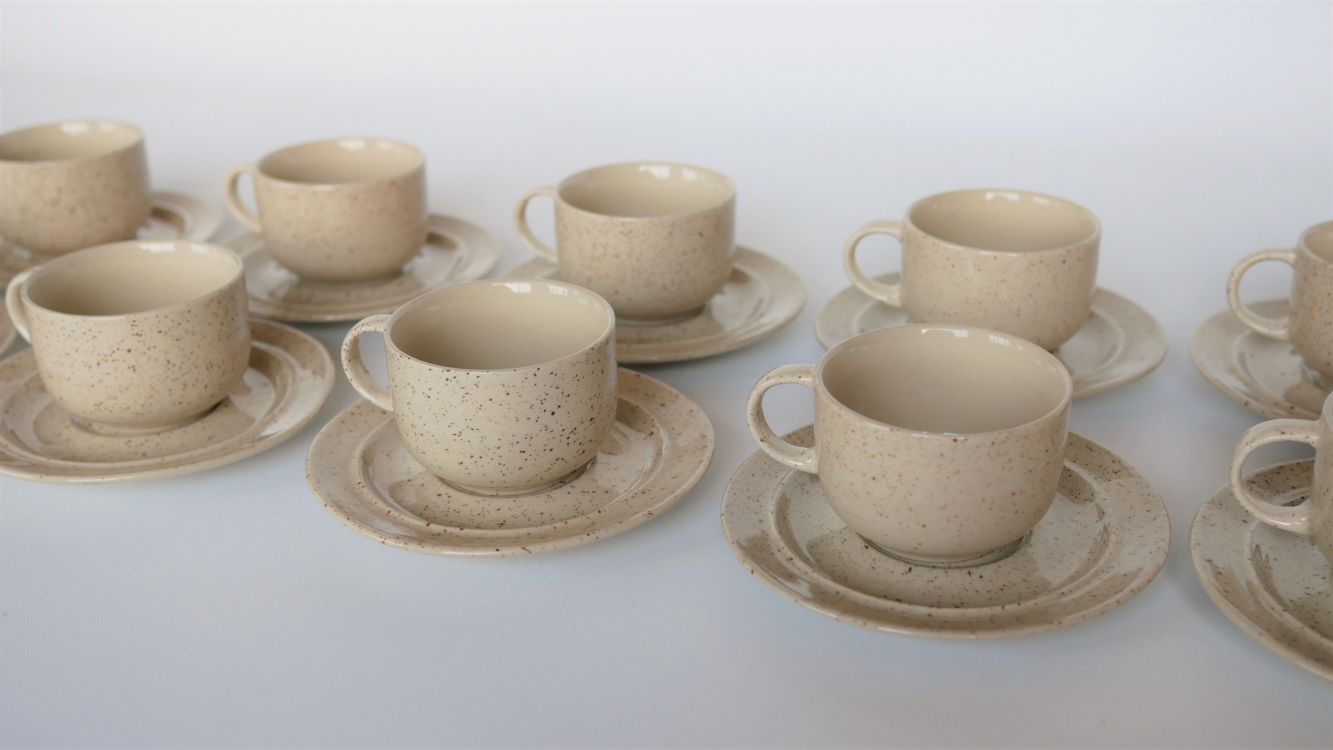 Coffee cup and vintage pyrity sandstone subcup