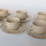 Coffee cup and vintage pyrity sandstone subcup