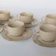 Coffee cup and vintage pyrity sandstone subcup
