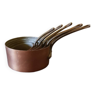 Set of 5 tinned copper pans.