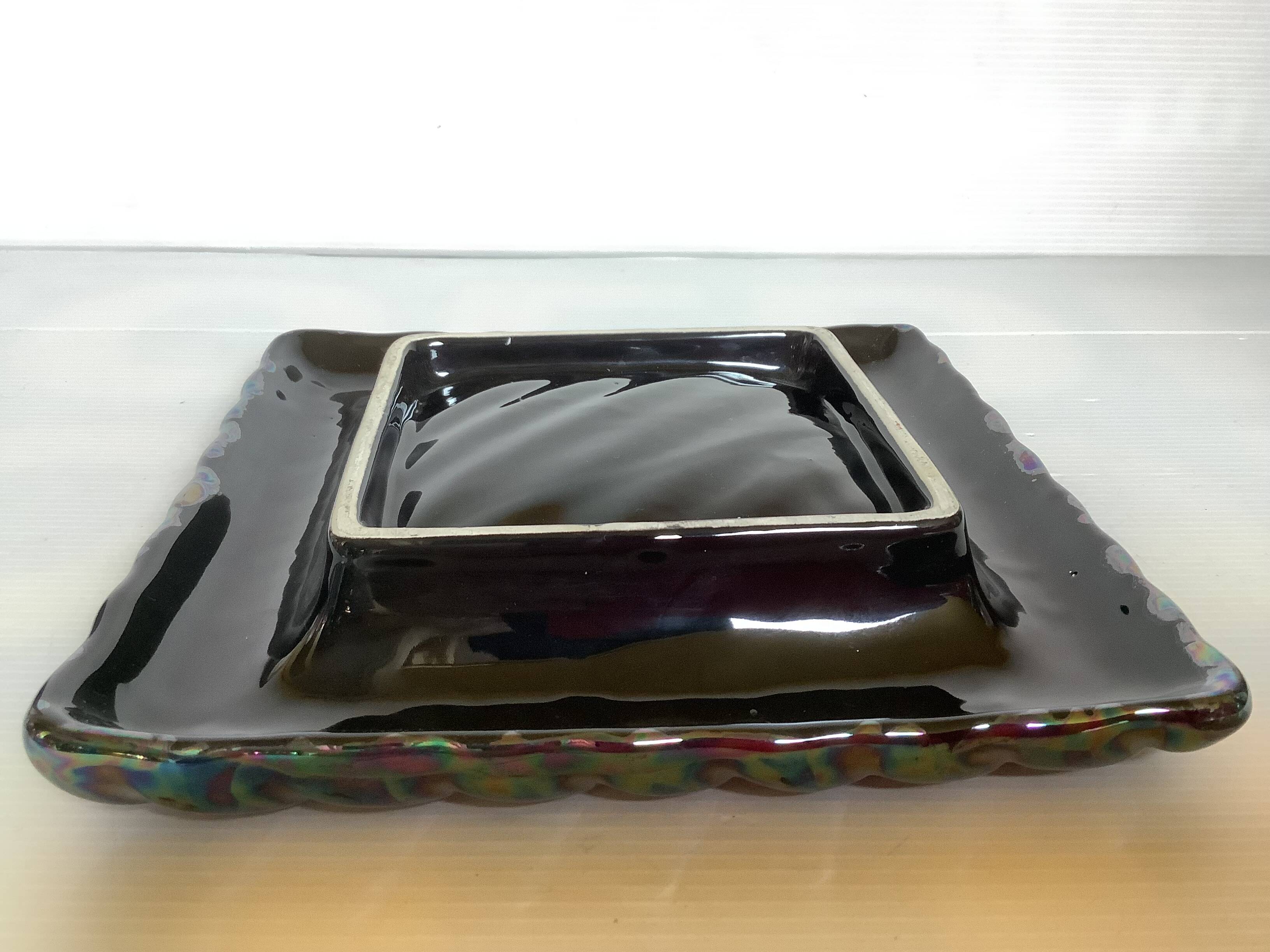 70s iridescent black pocket emptier