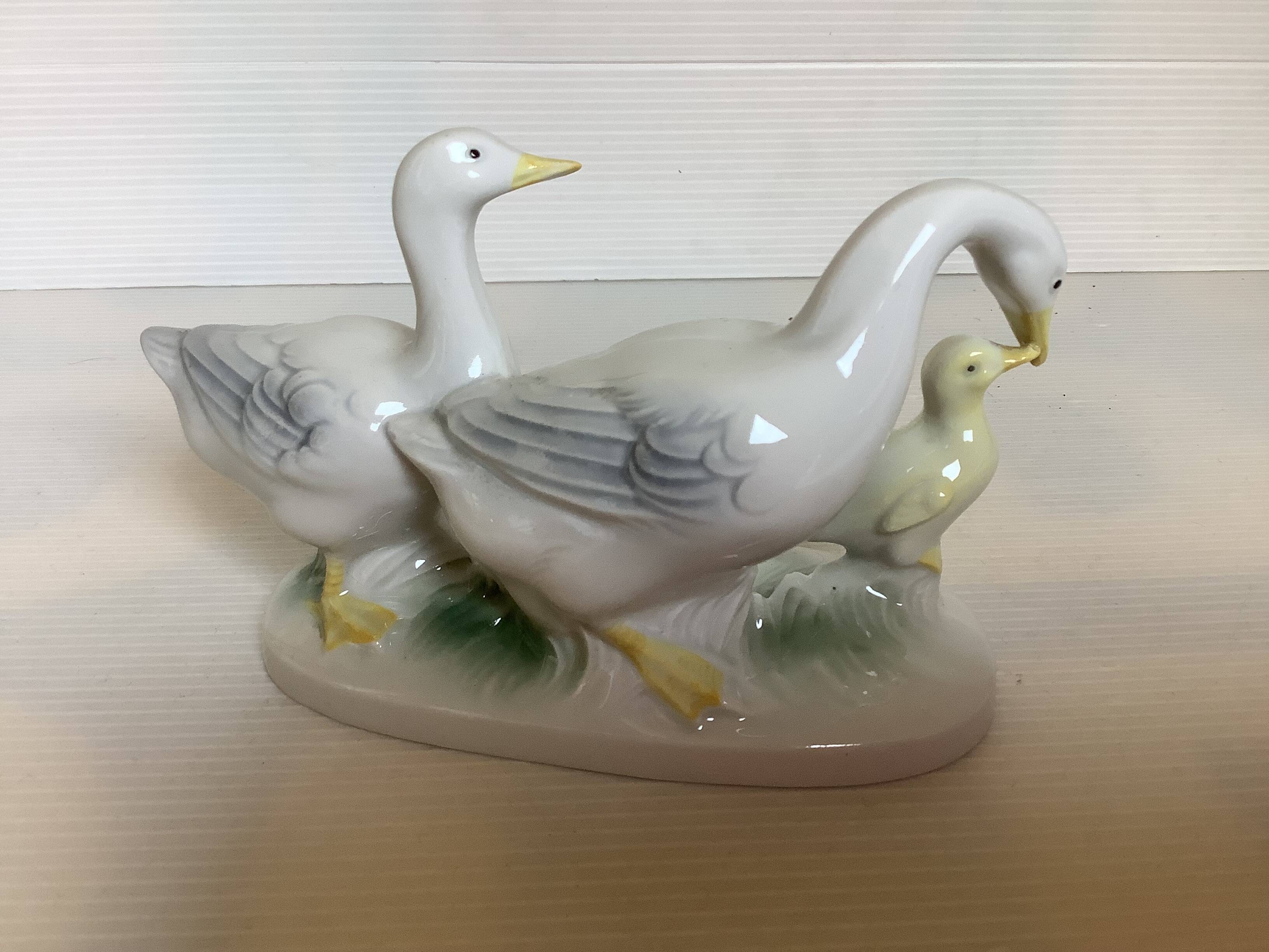Trio of ceramic geese