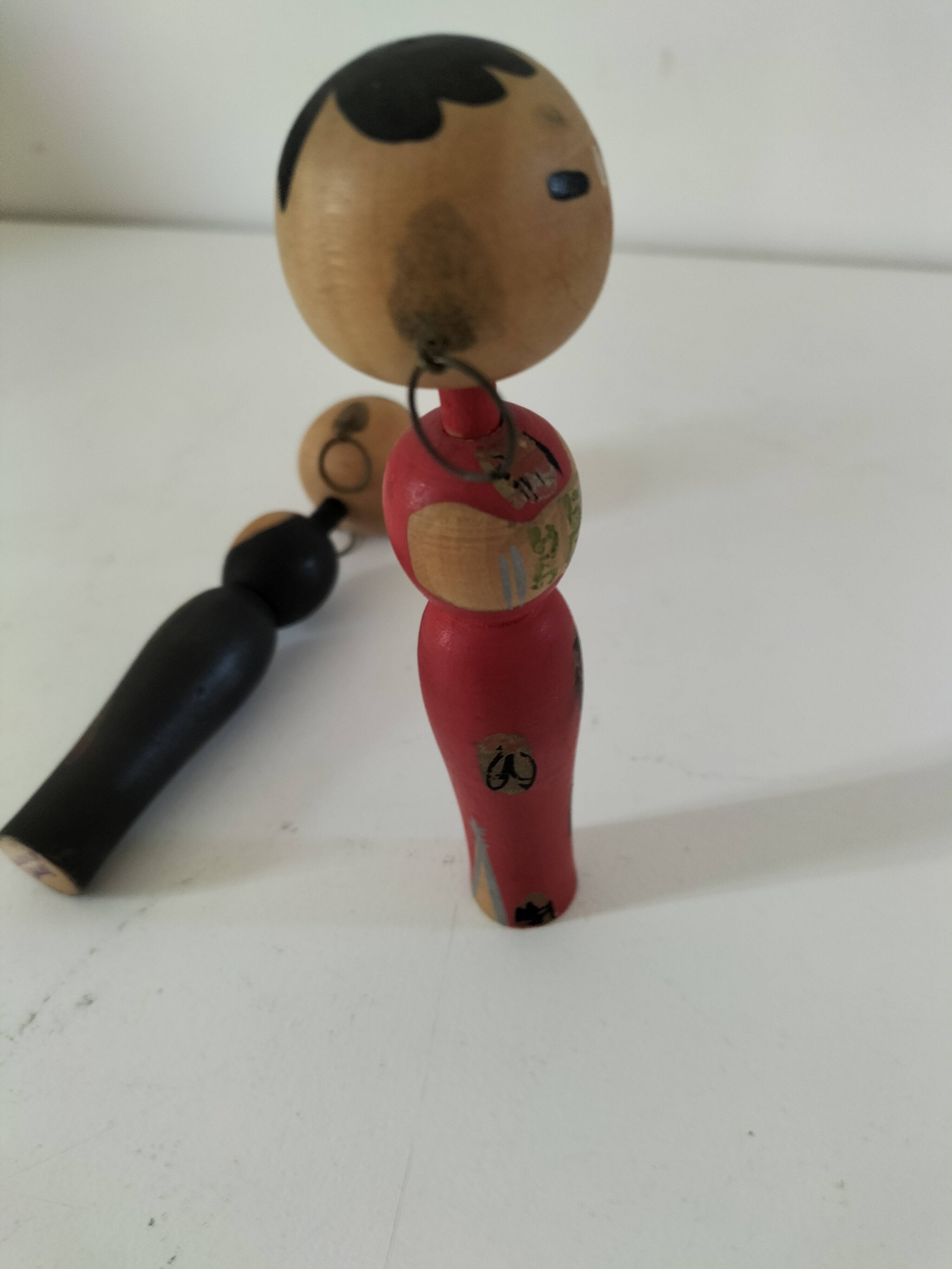 Pair of Japanese Kokeshi dolls - 1950s-1970s