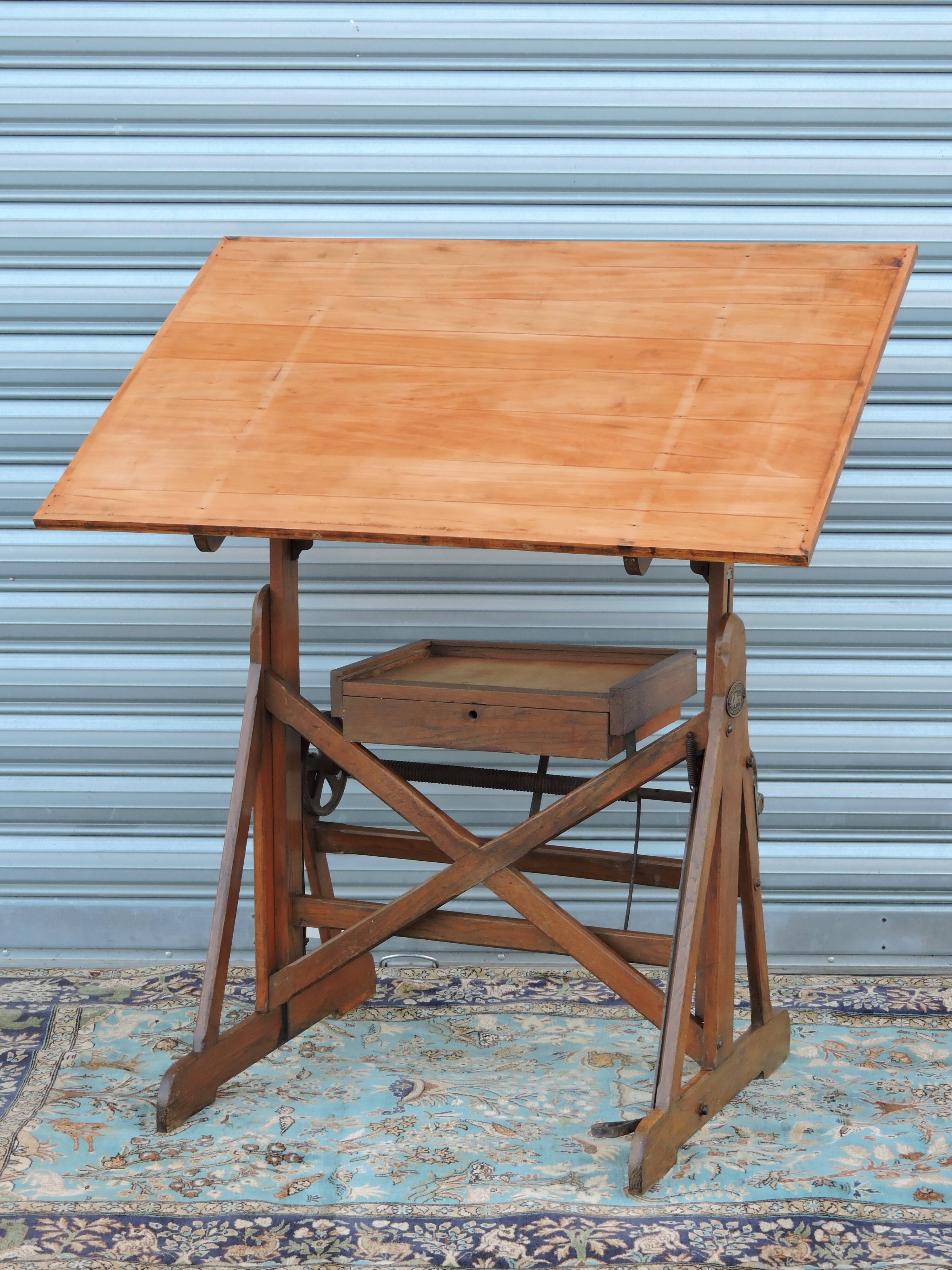 Architect's table has industrial adjustable design H Morin betting