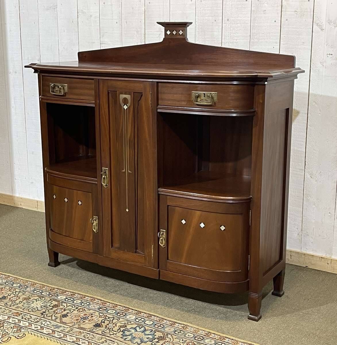 Mahogany sideboard from the Art Nouveau period in the style of Gustave Serrurier-Bovy.