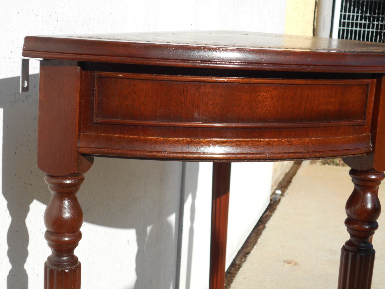 English-style half-moon console, mahogany and leather