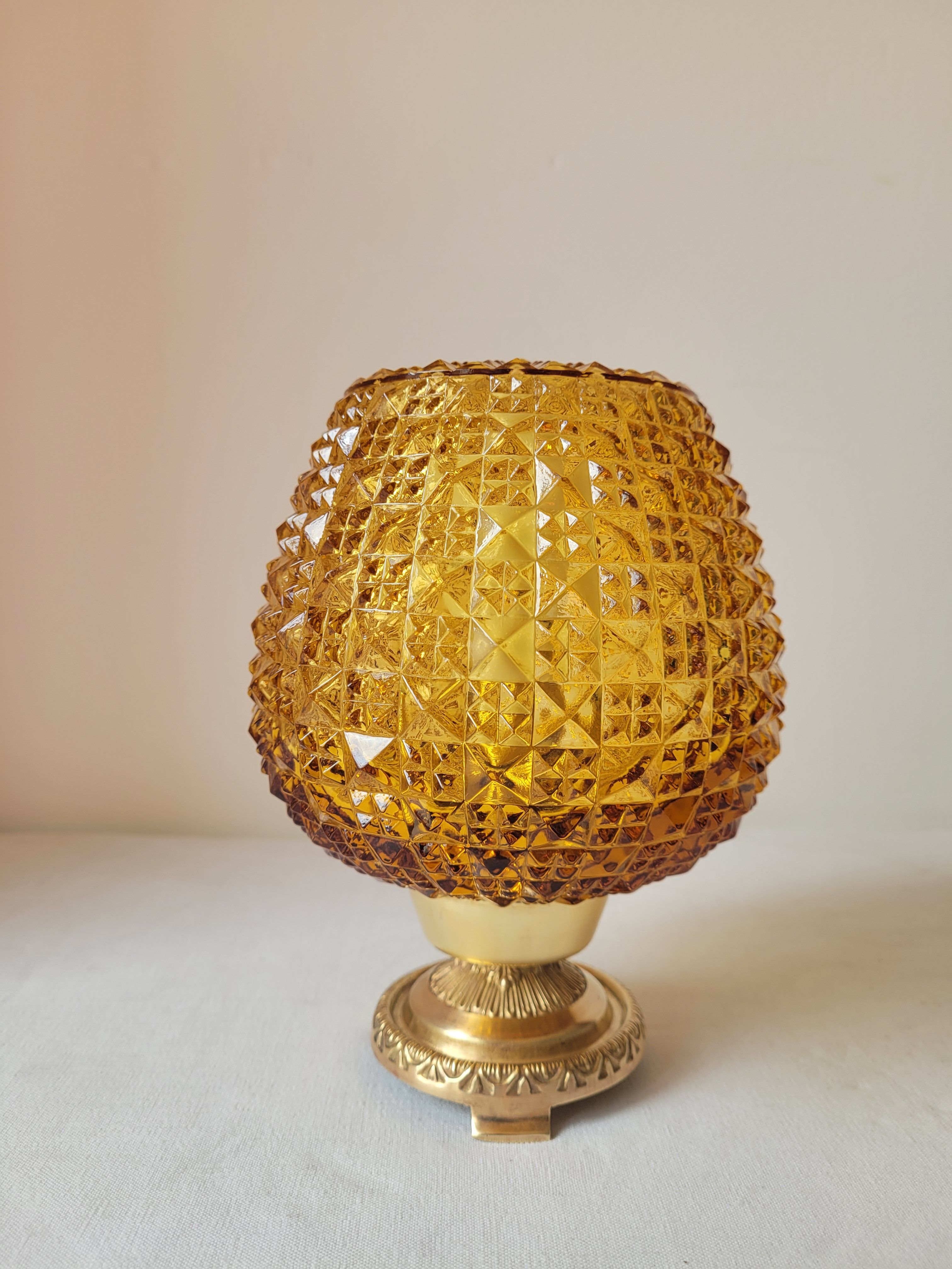 Bedside lamp in amber glass and brass
