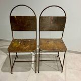 Pair of vintage raw metal chairs