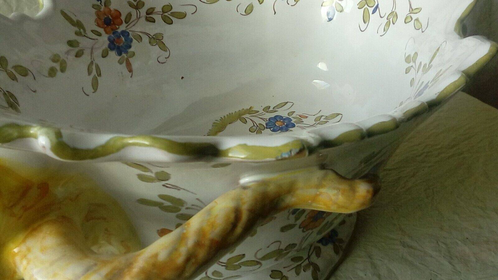 Moustiers earthenware planter with ram's head