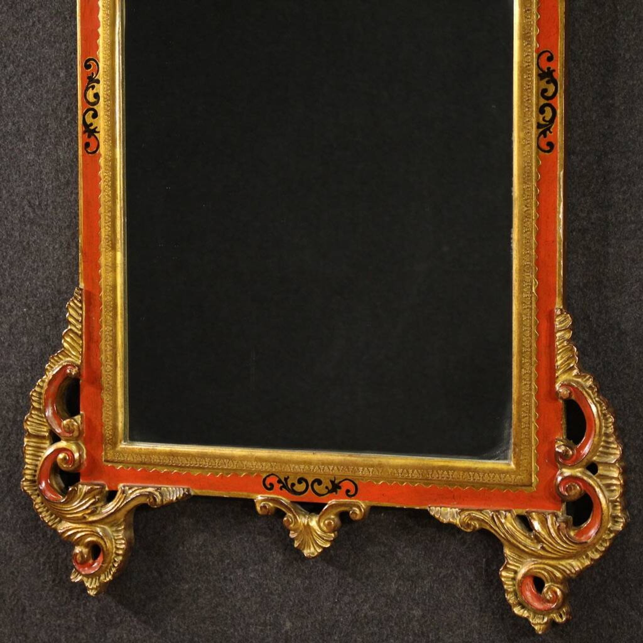Miroir toscan laqué et doré du XXe siècle