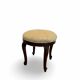 An antique Italian bar chair and a matching tufted vanity stool.