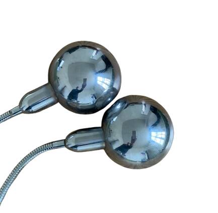 Pair of vintage chrome metal desk lamps with adjustable goosenecks.