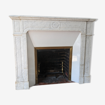 Old white marble fireplace