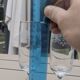 Set of 15 engraved crystal glasses with a gold rim.