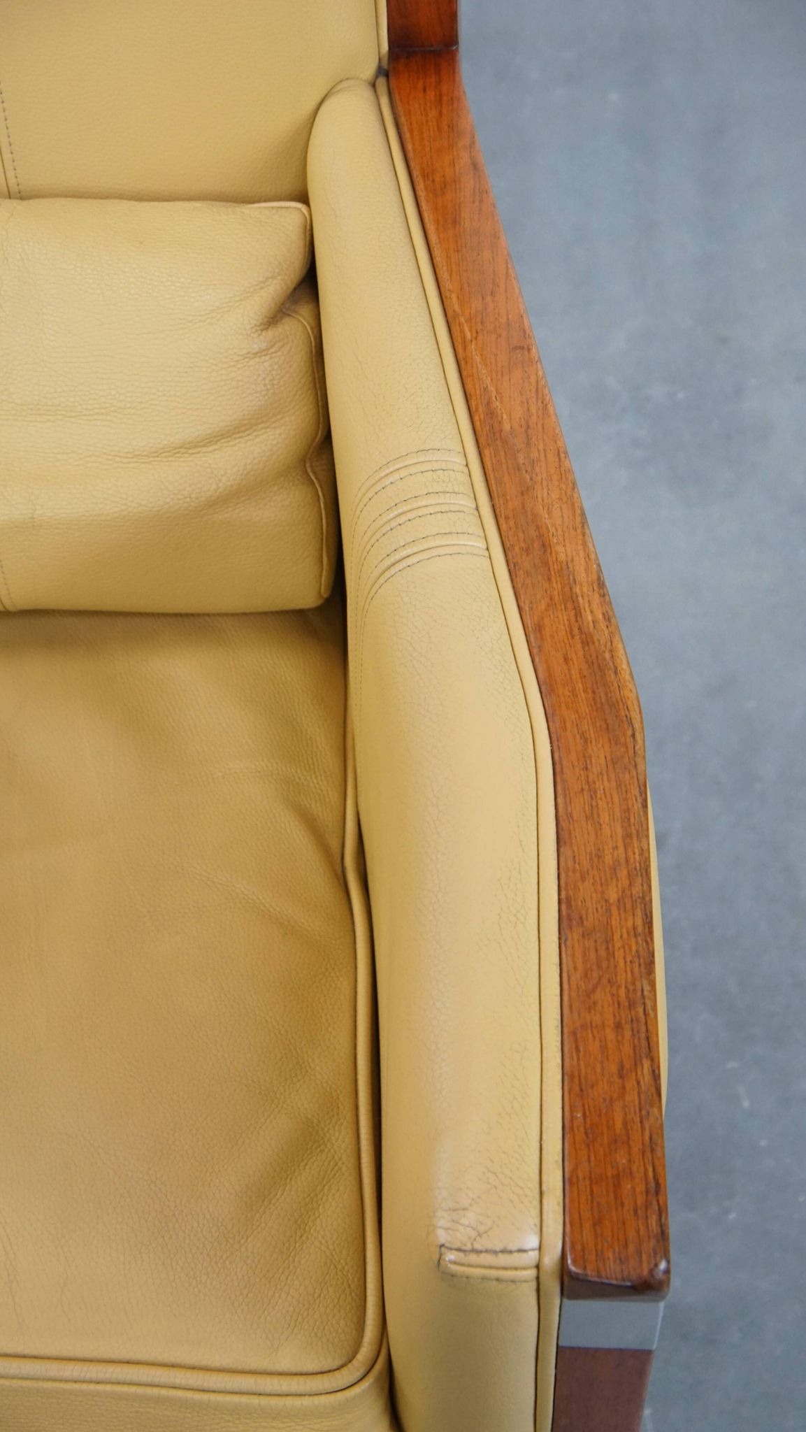 Art Deco armchair in yellow leather with high back