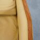 Art Deco armchair in yellow leather with high back