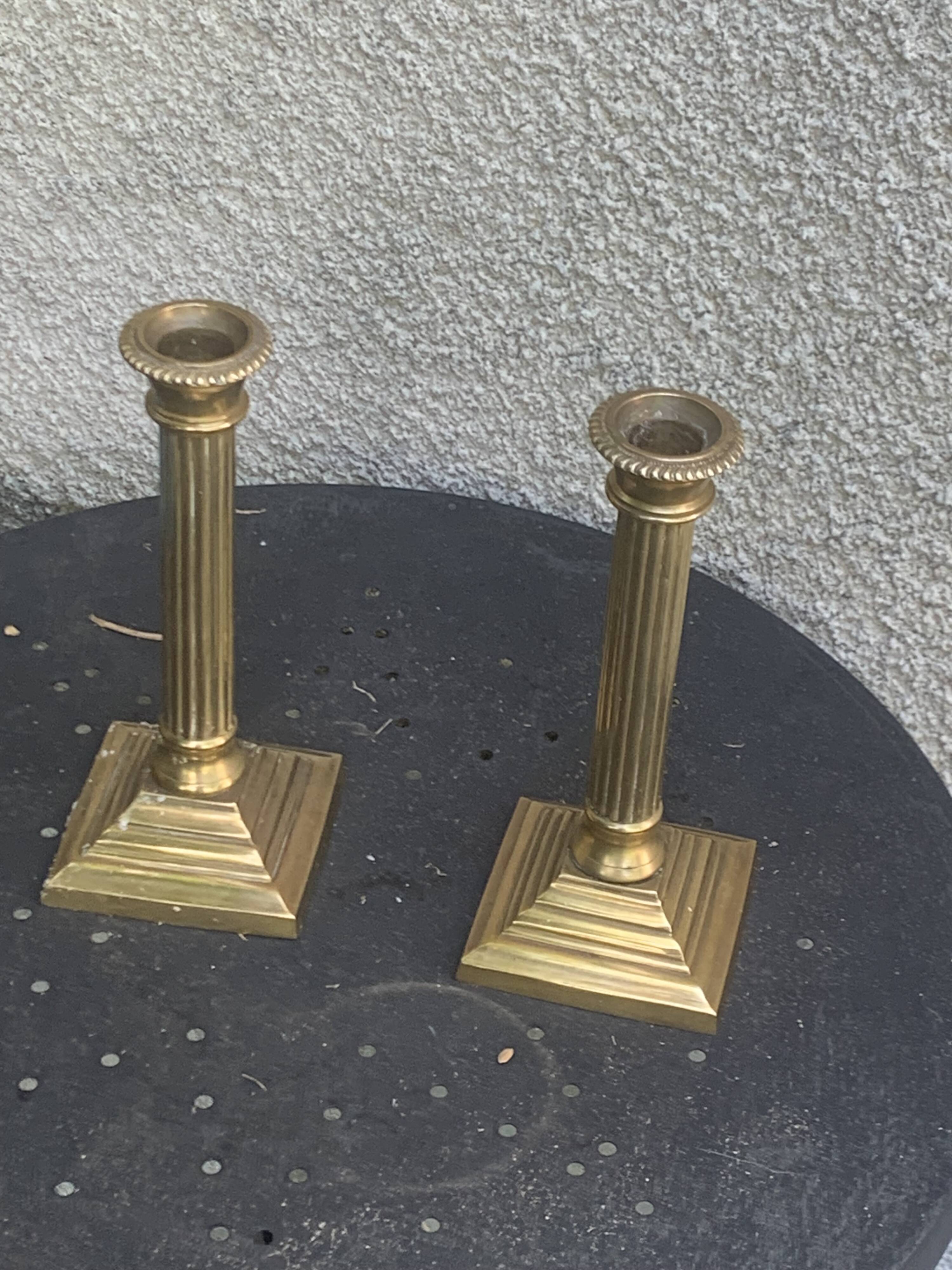 Pair of gilded brass candlesticks, vintage column shape