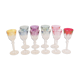 10 glasses with coloured liquor