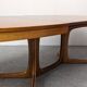 Oval extendable dining table by Baumann, France circa 1970.