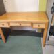 Rattan and varnished pine desk