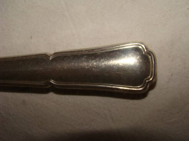 12 table knives with trilobate handles by the brand "G.Vivier"