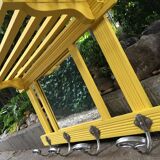 Yellow vintage coat holder
