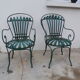 Pair of wrought iron garden chairs by François Carre