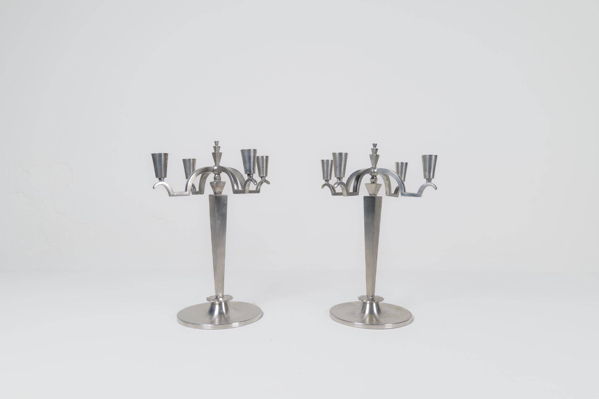 Sculptural Art Deco set of chandeliers in tin, Sweden, 1940s.