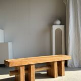 Banc en bois massif piètement ajouré traversé par un cylindre - Teck
