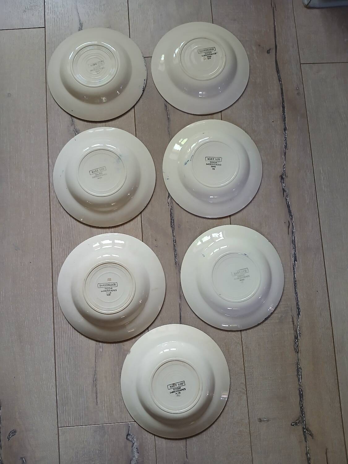 7 Digoin and Sarreguemines soup plates