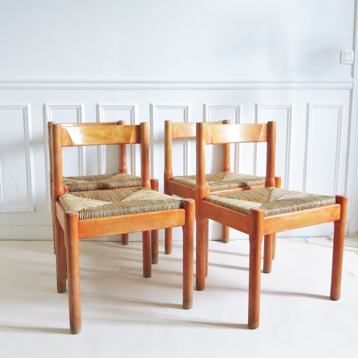 Four chairs Carimate Vico Magistretti Cassina