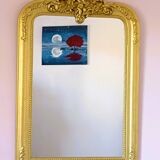 Gilded mirror with a Louis Philippe style pediment