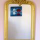 Miroir doré a fronton style Louis Philippe